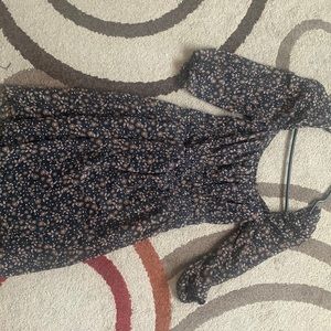 I am selling a Brown floral trixxi dress.